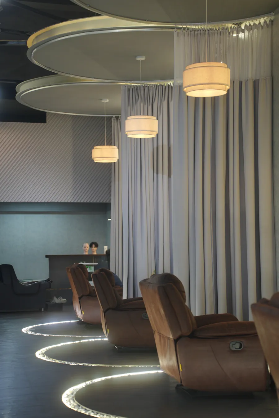 Reclining massage chairs in the Headboss relaxing lounge